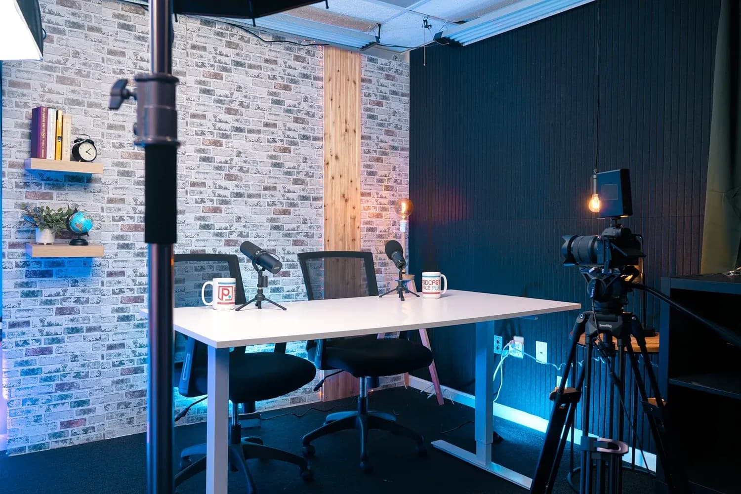 Podcast microphones and seating in the main recording studio